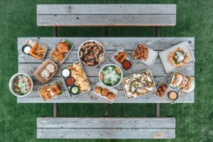 top view of picnic table with food on it