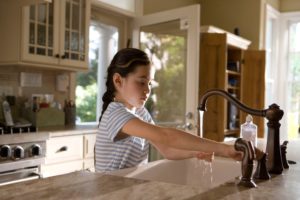 girl at sink