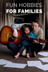 graphic for fun hobbies for families featuring mom and toddler daughter playing guitar together