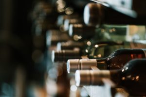 side view of a rack of wine bottles