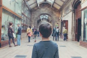 picture of a boy in a museum taken from behind his head