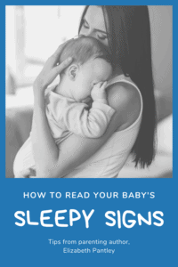 how to read your baby's sleepy signs graphic with black and white picture of mom holding a baby rubbing their eyes