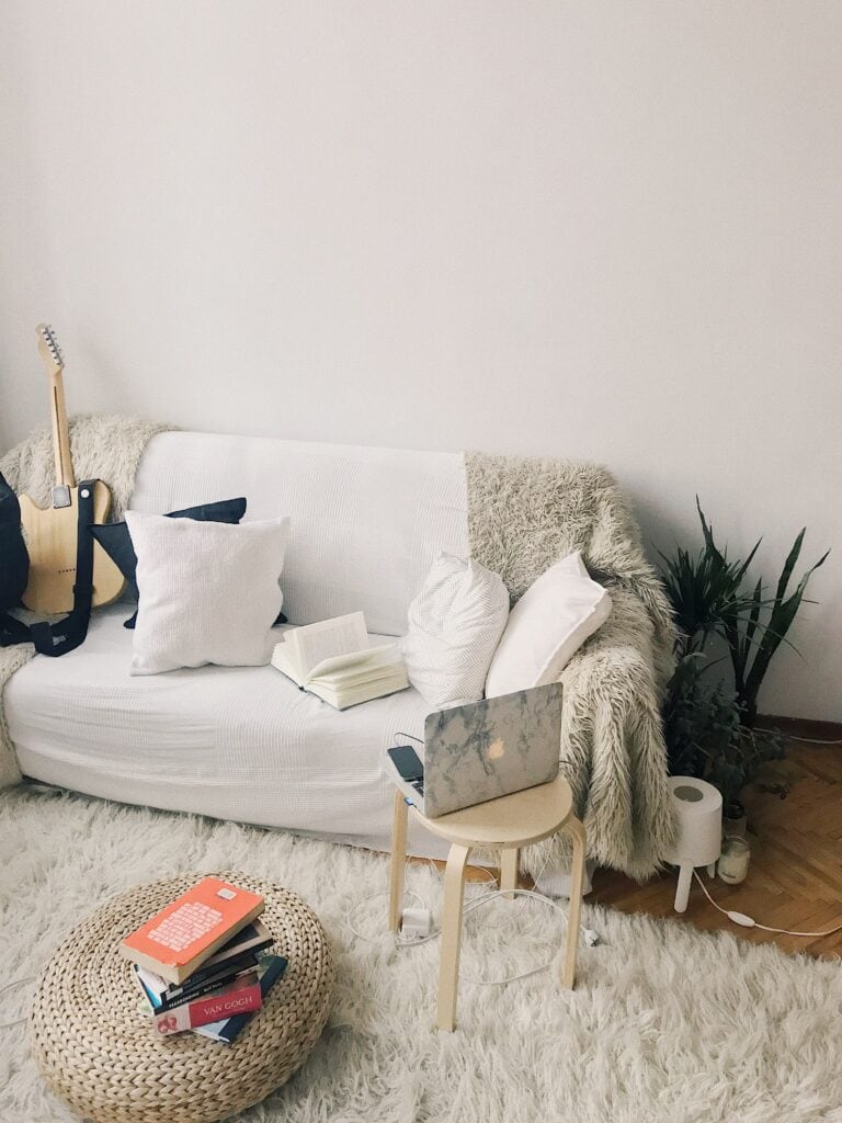 picture of a comfortable living room with white hues