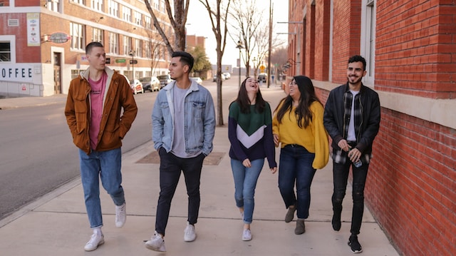 group of teens walking and talking