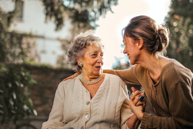 adult child speaking with older parent