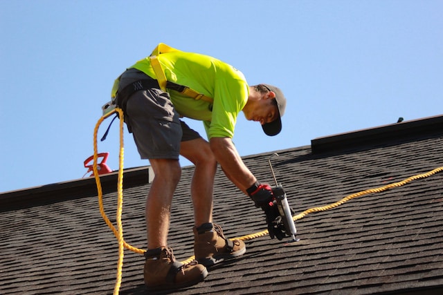 guy working on roof