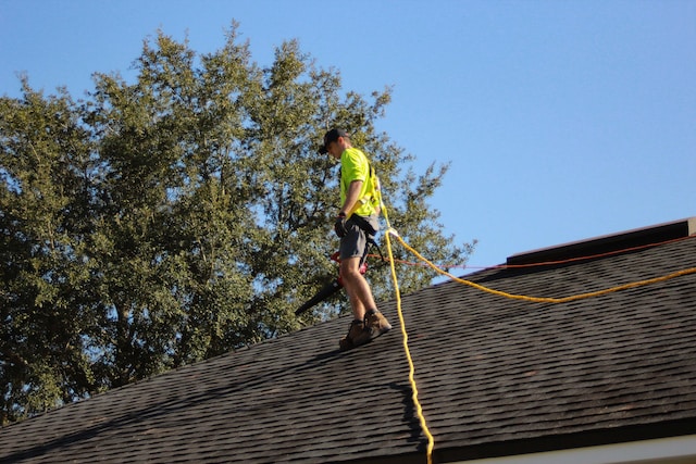 guy working on roof