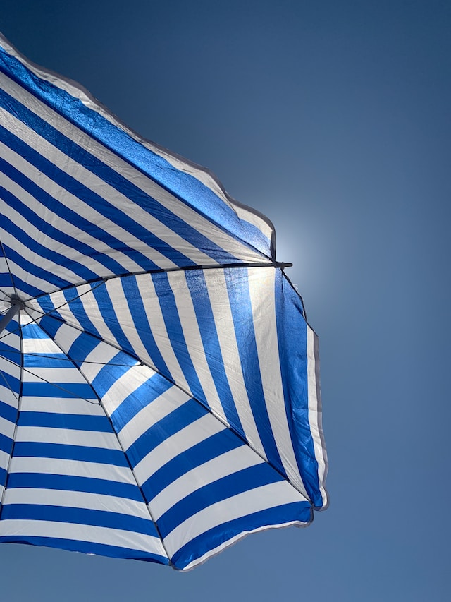 blue and white beach umbrella