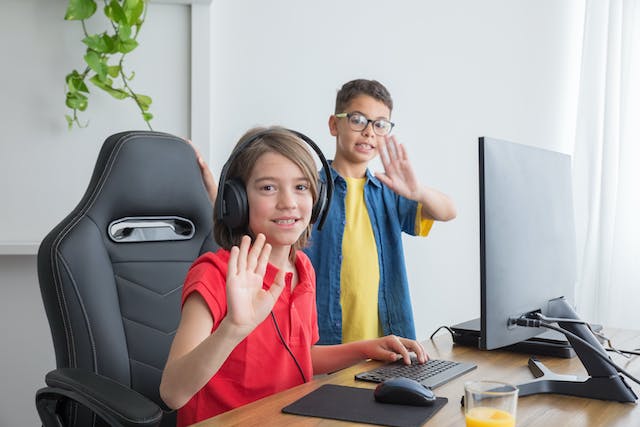 boy and girl at computer
