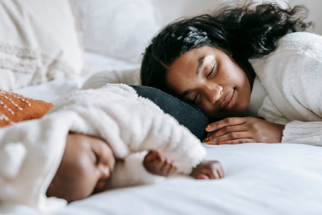 mom sleeping with baby