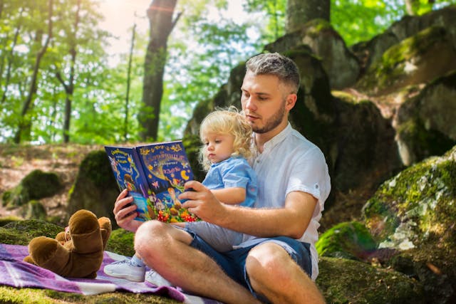dad reading daughter book