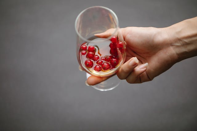 woman holding drink