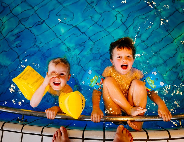 two young boys in pool