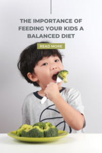 boy eating broccoli