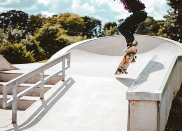 boy on skateboard in skate park