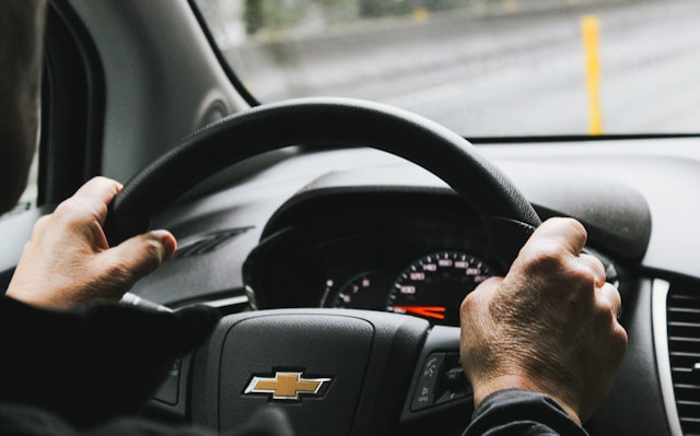 hands on steering wheel