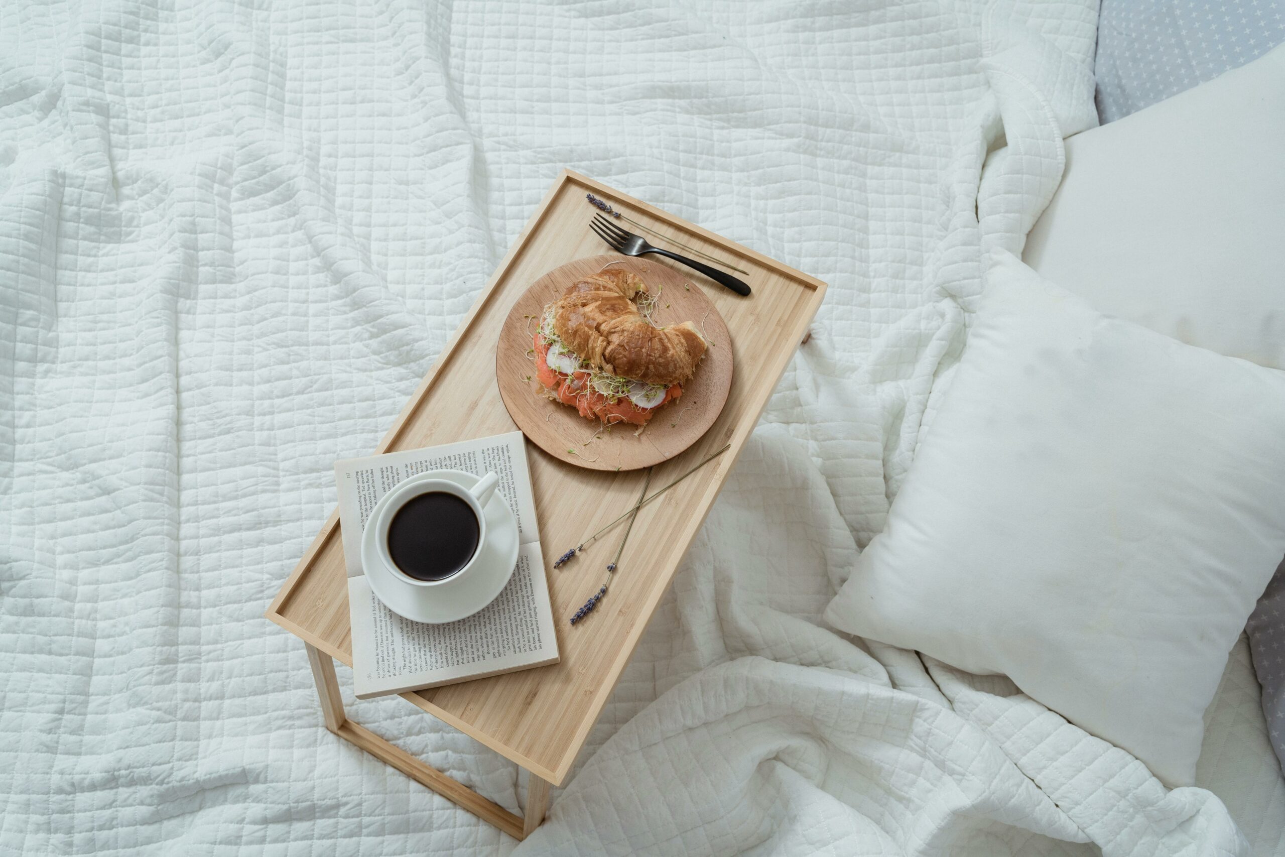 tray of breakfast on bed