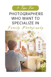 photographer taking photo of family in front of house
