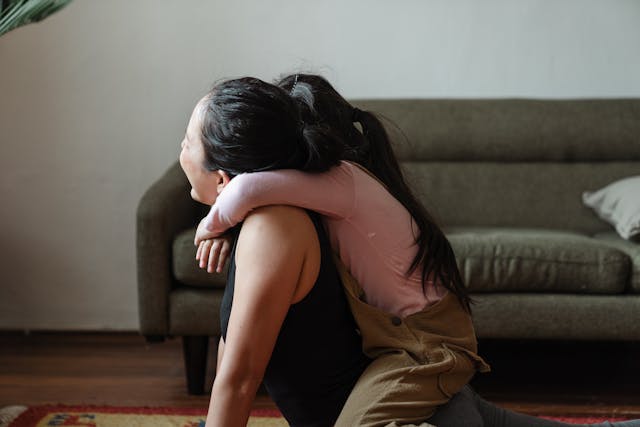 daughter hugging mom