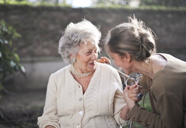 happy grandmother and granddaughter