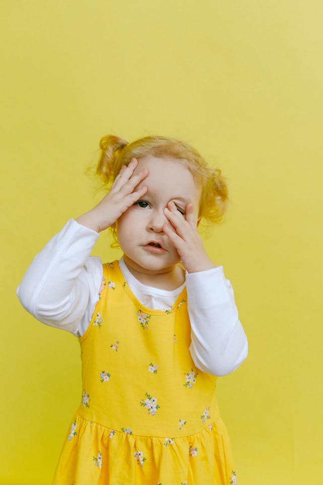 girl in yellow dress with yellow background