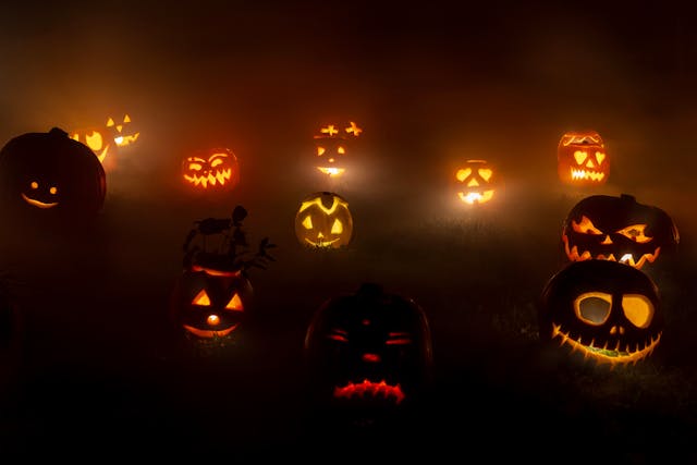 scary pumpkins at night glowing