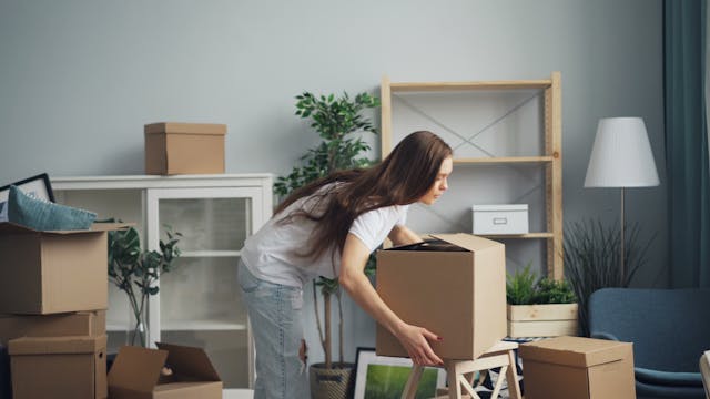 woman with moving boxes