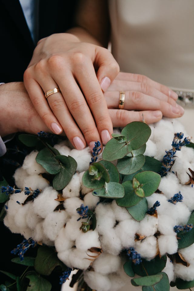 hands with wedding rings