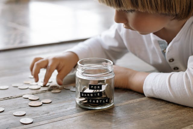 boy counting coins