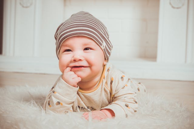 baby smiling on tummy