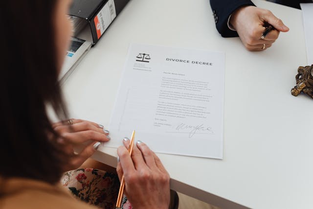 woman reviewing divorce papers