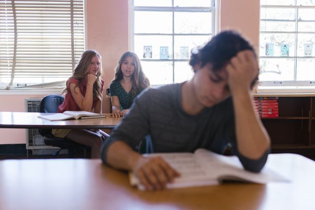 sad boy in school