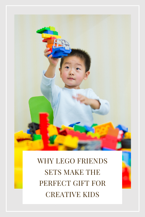boy playing with legos