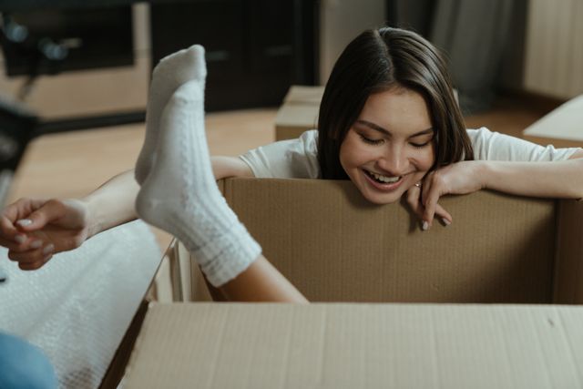 teens in moving boxes