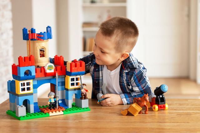 boy building legos