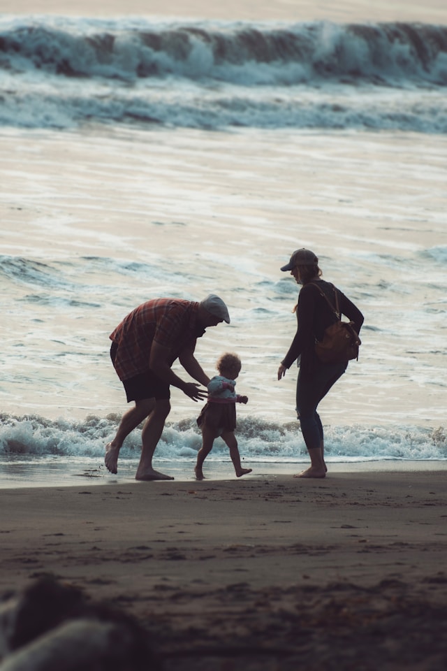 family by the water