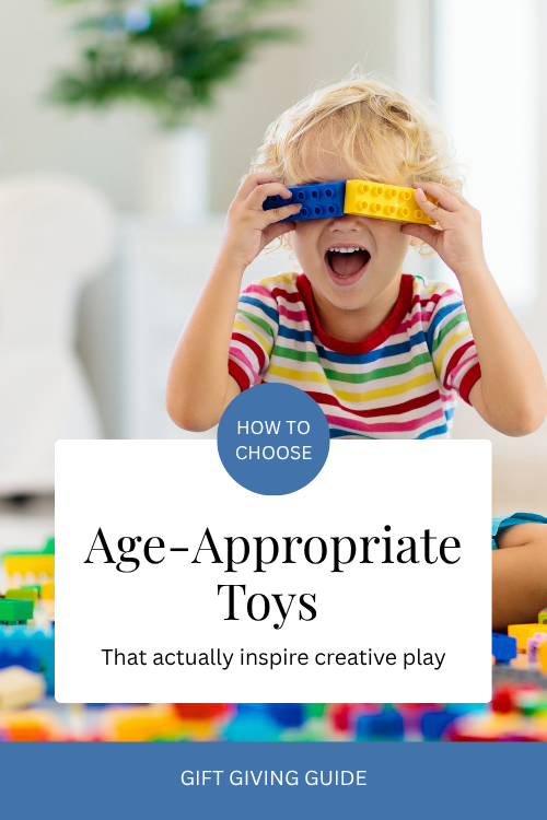 boy playing with colorful blocks