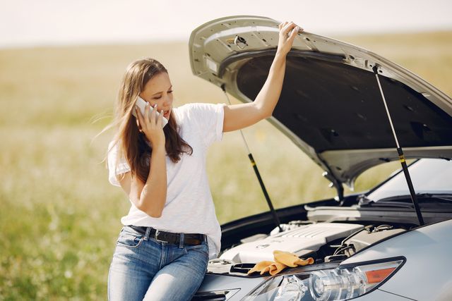 roadside trouble, girl calling on cell phone