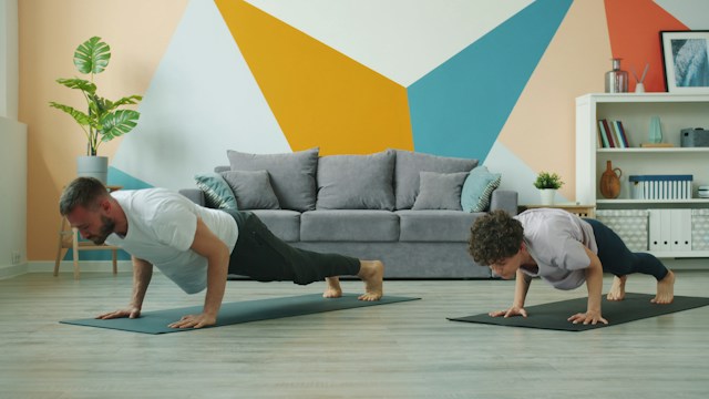 father and son doing push ups