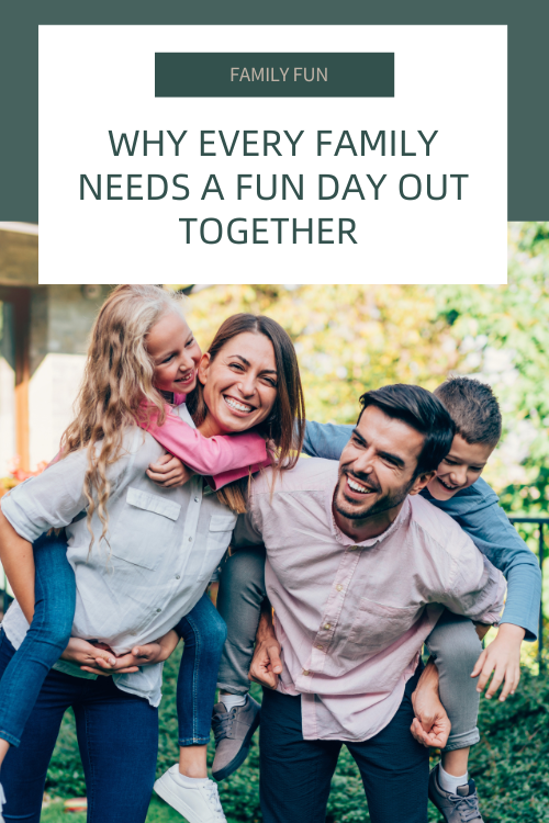 family laughing outside